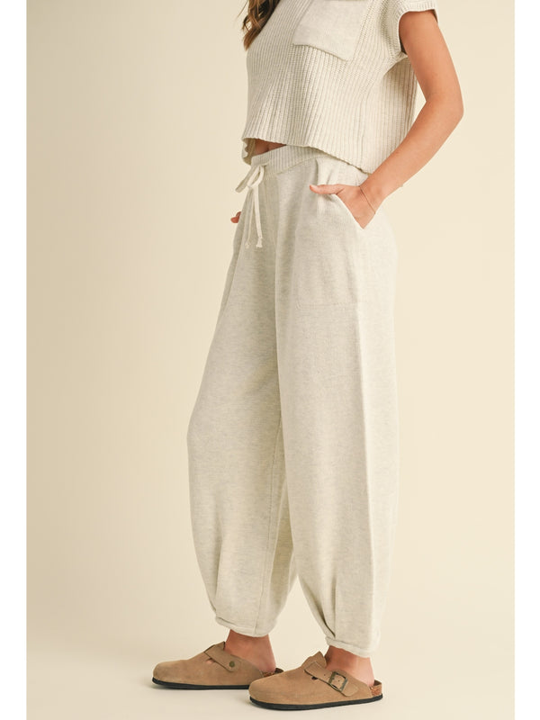 Miou Muse Rita Pleated Bottom Knit Pants In White